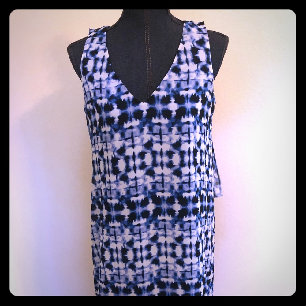 Cute dress with extra details- worn twice